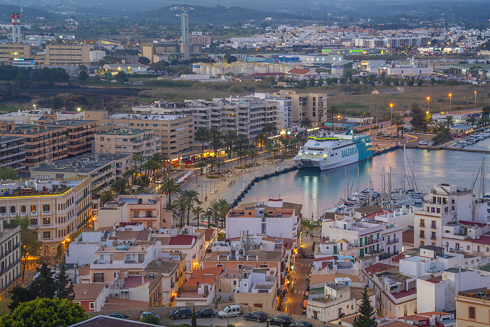 Elevated view of harbour, Dalt Vila district and city defence walls at dusk, UNESCO World Heritage Site, Ibiza Town, Eivissa, Balearic Islands, Spain, Mediterranean, Europe