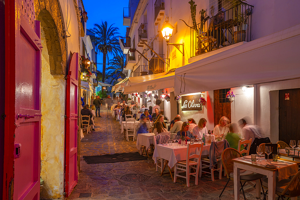 View of restaurants and bars in Dalt Vila at dusk, UNESCO World Heritage Site, Ibiza Town, Eivissa, Balearic Islands, Spain, Mediterranean, Europe