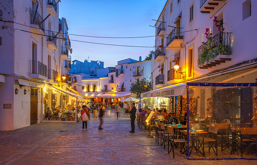 View of restaurants and bars in Dalt Vila at dusk, UNESCO World Heritage Site, Ibiza Town, Eivissa, Balearic Islands, Spain, Mediterranean, Europe