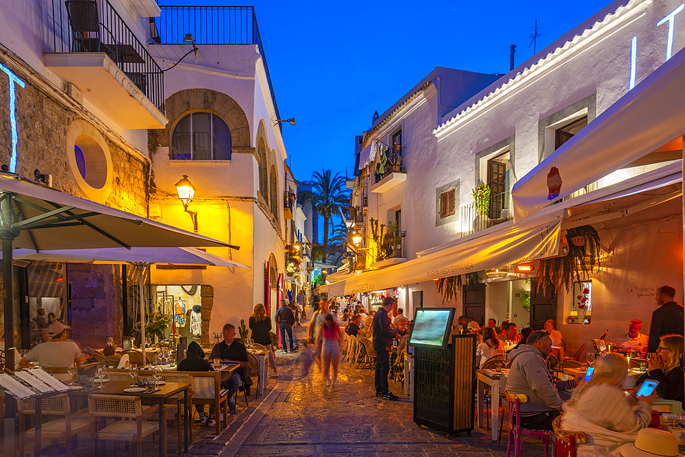 View of restaurants and bars in Dalt Vila at dusk, UNESCO World Heritage Site, Ibiza Town, Eivissa, Balearic Islands, Spain, Mediterranean, Europe