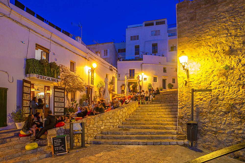 View of restaurants and bars in Dalt Vila at dusk, UNESCO World Heritage Site, Ibiza Town, Eivissa, Balearic Islands, Spain, Mediterranean, Europe