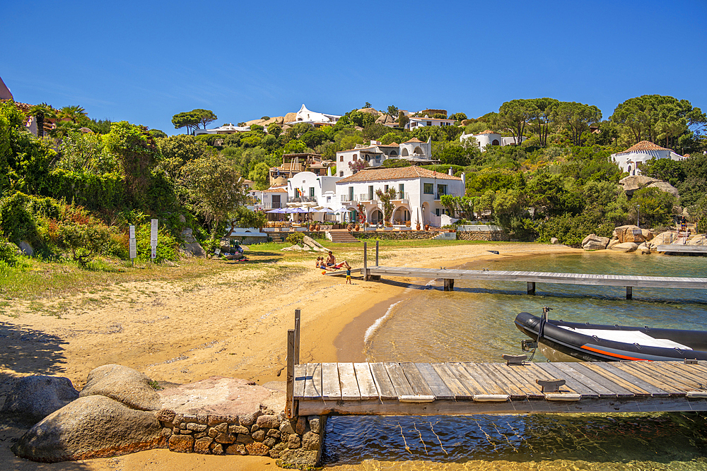 View of beach and whitewashed villas of Porto Rafael, Sardinia, Italy, Mediterranean, Europe