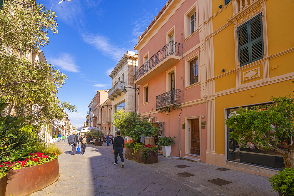 View of shops and restaurant on Corso Umberto I on sunny day in Olbia, Olbia, Sardinia, Italy, Mediterranean, Europe