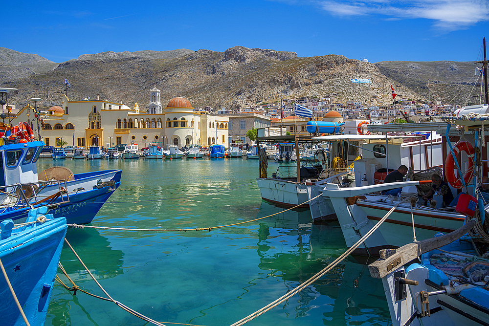 View of harbour boats in Kalimnos with hills in the background, Kalimnos, Dodecanese Islands, Greek Islands, Greece, Europe