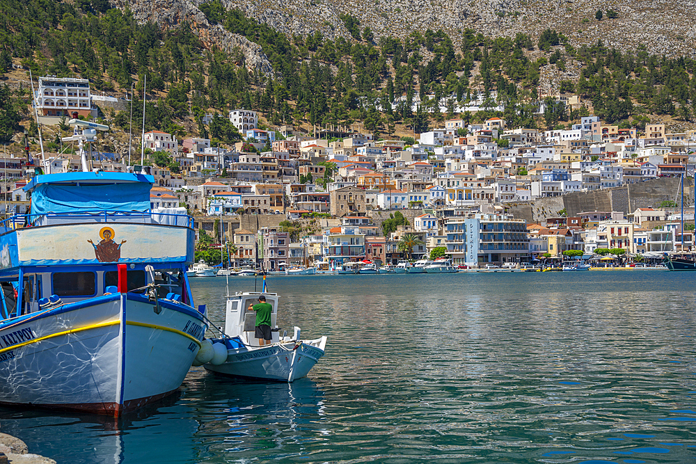 View of port and town of Kalimnos with hills in the background, Kalimnos, Dodecanese Islands, Greek Islands, Greece, Europe