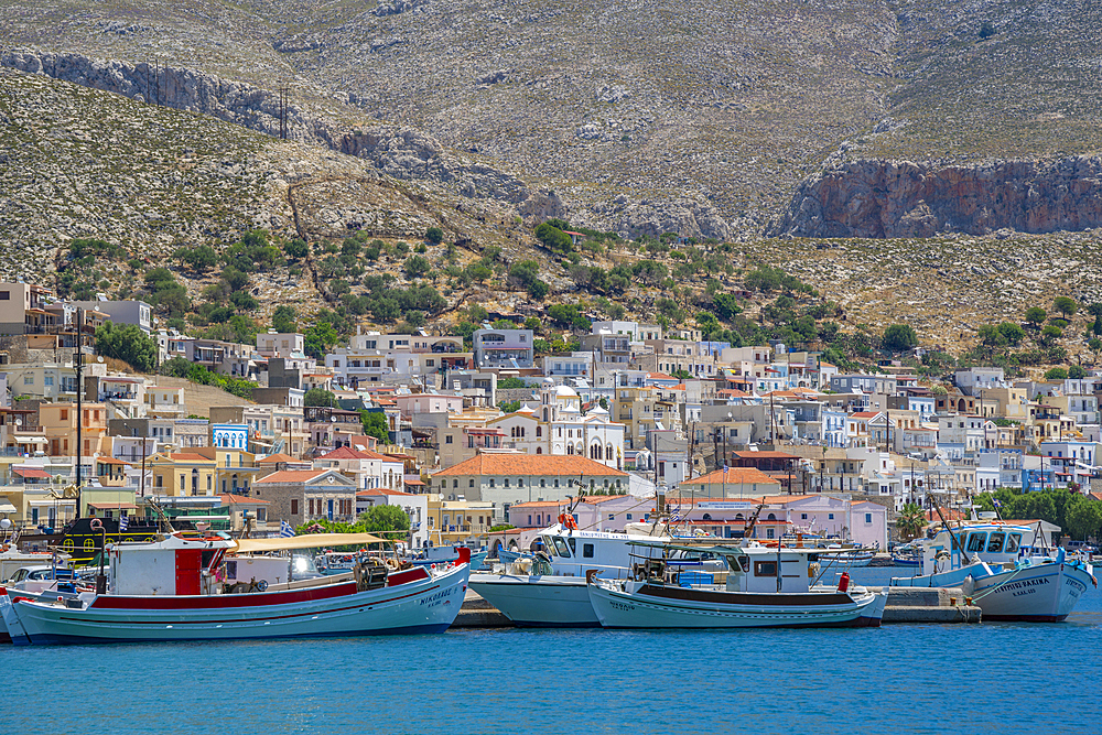 View of port and town of Kalimnos with hills in the background, Kalimnos, Dodecanese Islands, Greek Islands, Greece, Europe