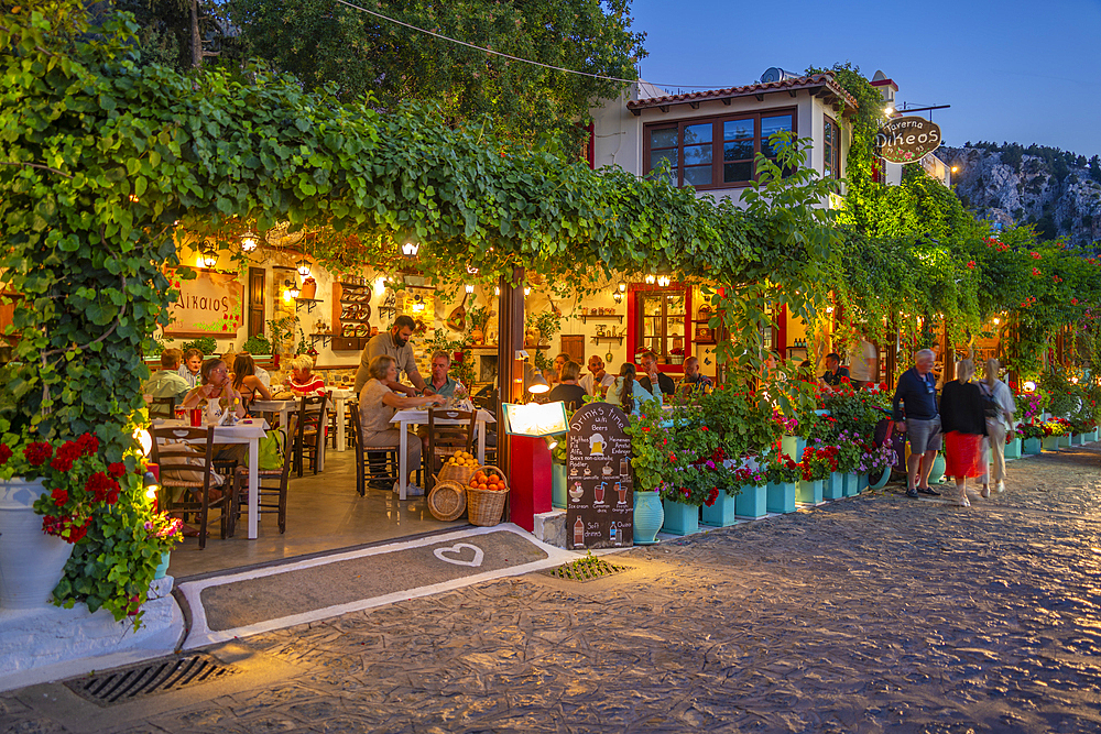 View of restaurant in Zia Sunset View at dusk, Zia Village, Kos Town, Kos, Dodecanese, Greek Islands, Greece, Europe