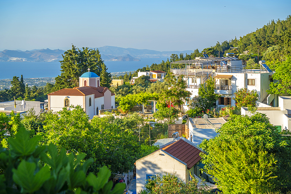 View of Greek Orthodox Church with sea in background, Zia Village, Kos Town, Kos, Dodecanese, Greek Islands, Greece, Europe