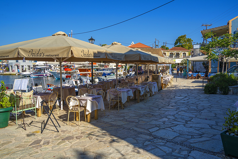 View of cafes and restaurants in Fiscardo harbour, Fiscardo, Kefalonia, Ionian Islands, Greek Islands, Greece, Europe