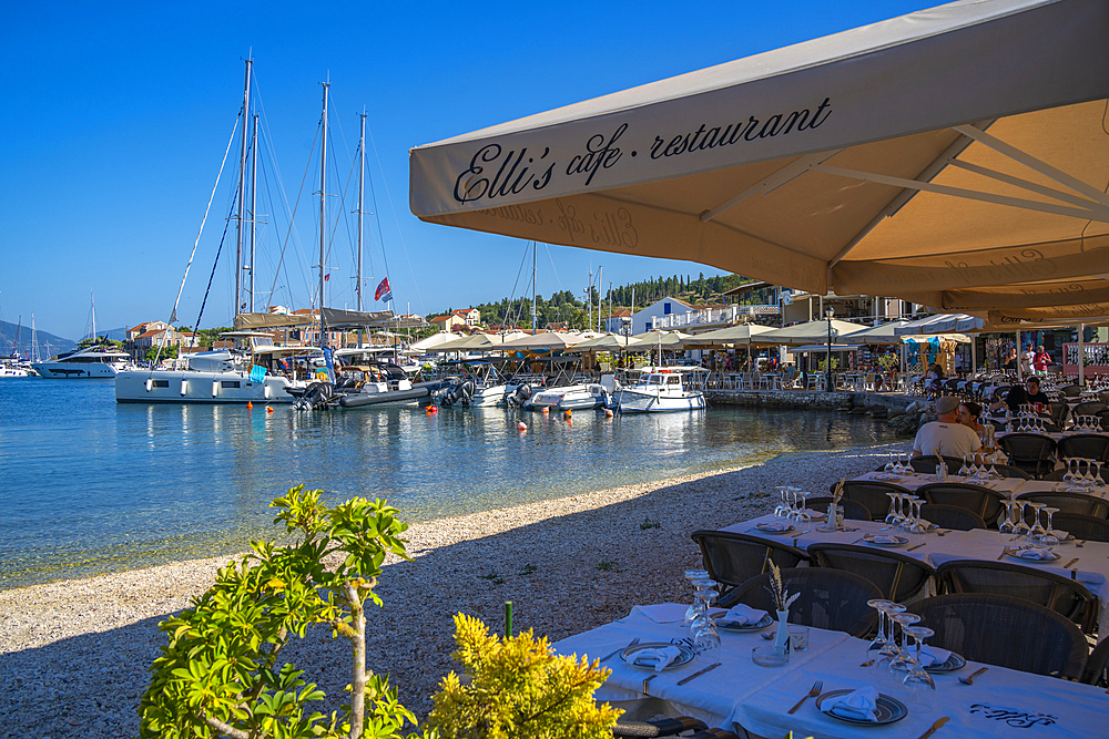 View of cafes and restaurants in Fiscardo harbour, Fiscardo, Kefalonia, Ionian Islands, Greek Islands, Greece, Europe