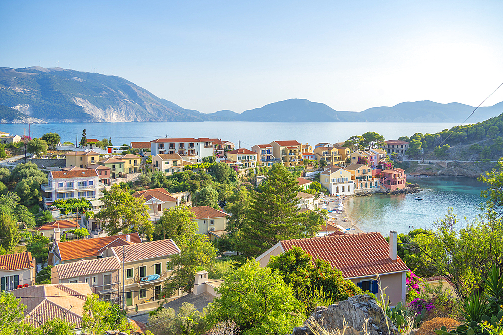 Elevated view of harbour and colourful houses in Assos, Assos, Kefalonia, Ionian Islands, Greek Islands, Greece, Europe