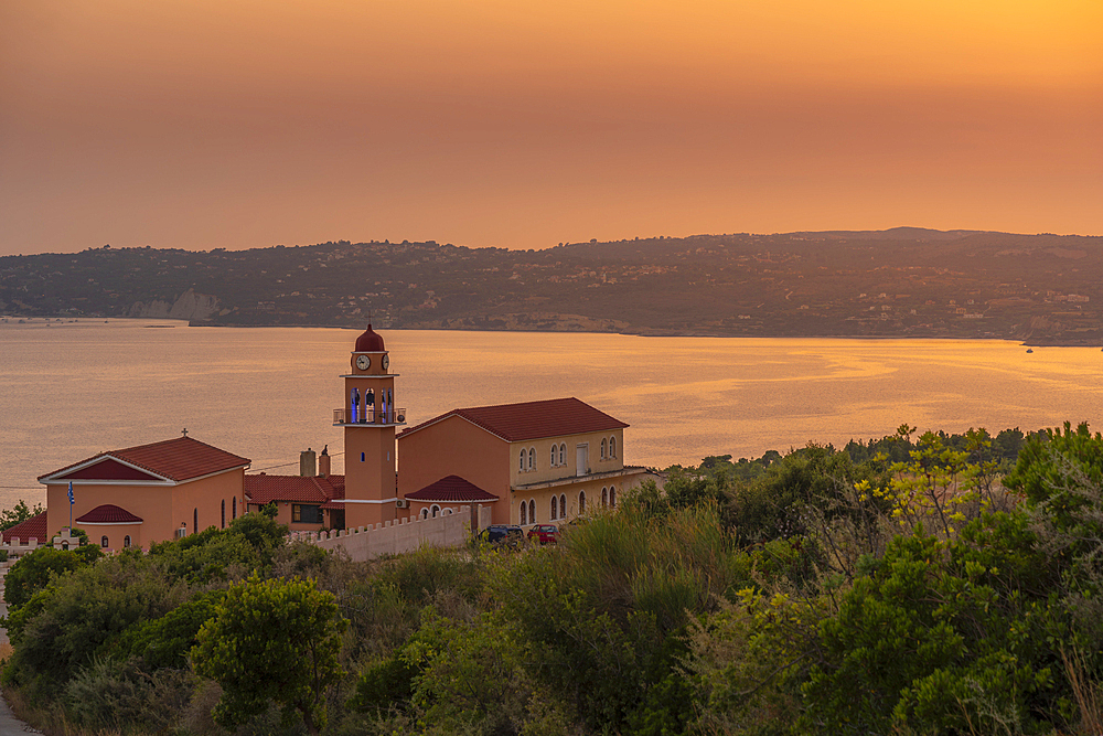 View of Holy Monastery of the Most Holy Theotokos of Sissia near Lourdata at sunset, Kefalonia, Ionian Islands, Greek Islands, Greece, Europe