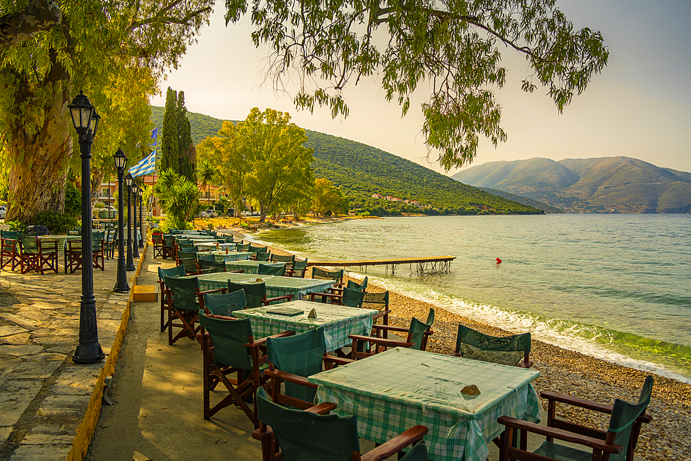 View of taverna tables at Karavomilos Lake in Sami, Sami, Kefalonia, Ionian Islands, Greek Islands, Greece, Europe