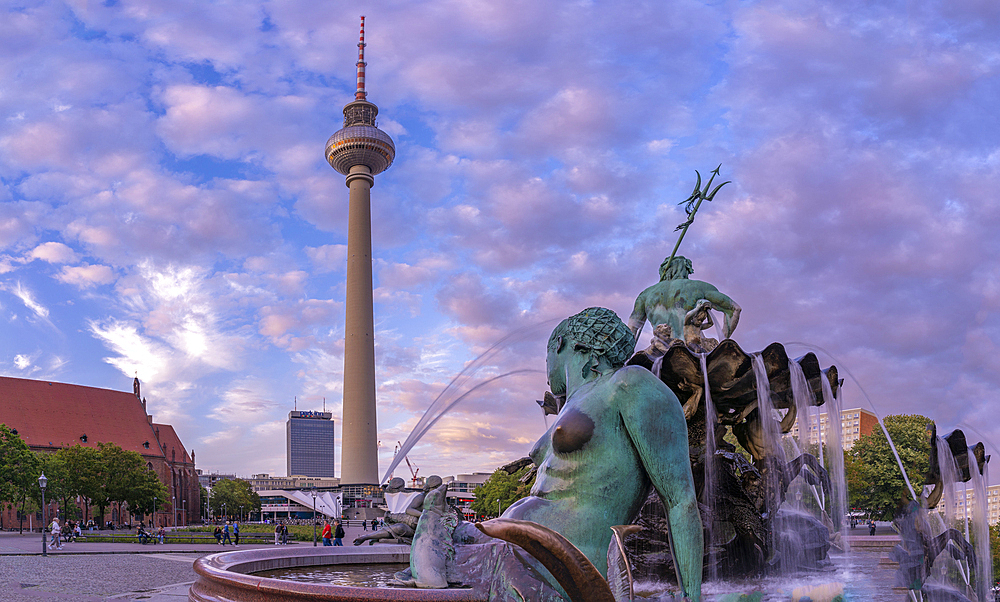 View of Berliner Fernsehturm and Neptunbrunnen fountain at dusk, Panoramastrasse, Berlin, Germany, Europe