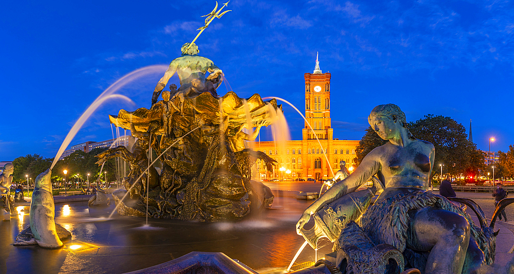 View of Rotes Rathaus (Town Hall) and Neptunbrunnen fountain at dusk, Panoramastrasse, Berlin, Germany, Europe