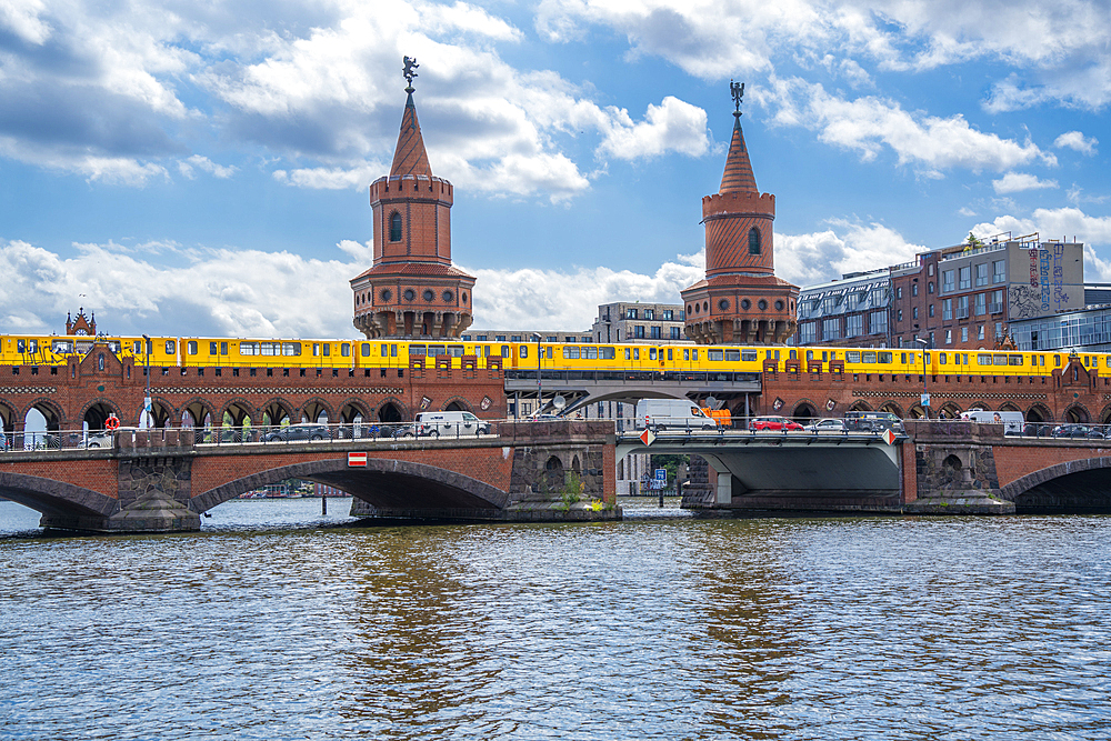 View of Oberbaum Bridge near Eastside section of the former Berlin Wall along the Spree River, Berlin, Germany, Europe