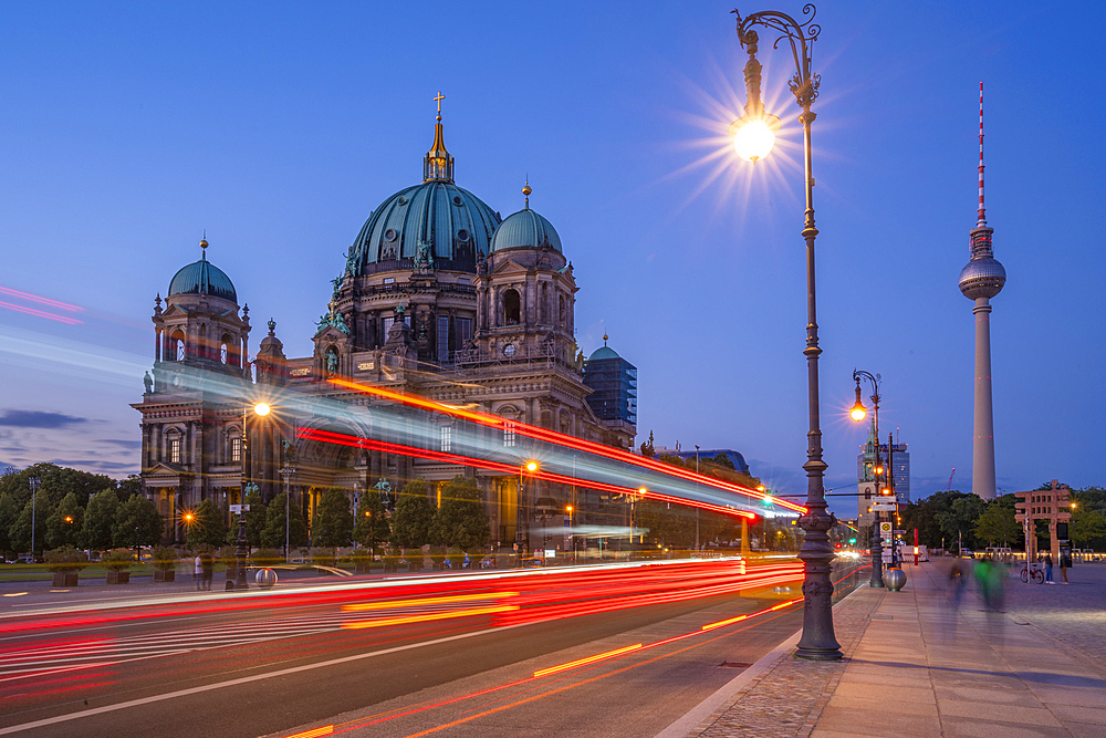 View of Berliner Dom (Berlin Cathedral) and trail lights at dusk, Berlin, Germany, Europe