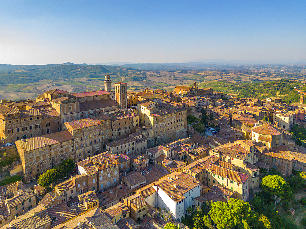 Elevated view of rooftops and town of Montepulciano at sunset, Montepulciano, Tuscany, Italy, Europe