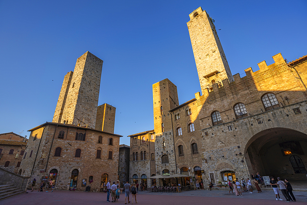 View of historic centre and towers in Piazza del Duomo, San Gimignano, UNESCO World Heritage Site, Province of Siena, Tuscany, Italy, Europe