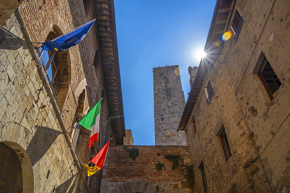 View of towers from narrow street in San Gimignano, San Gimignano, UNESCO World Heritage Site, Province of Siena, Tuscany, Italy, Europe