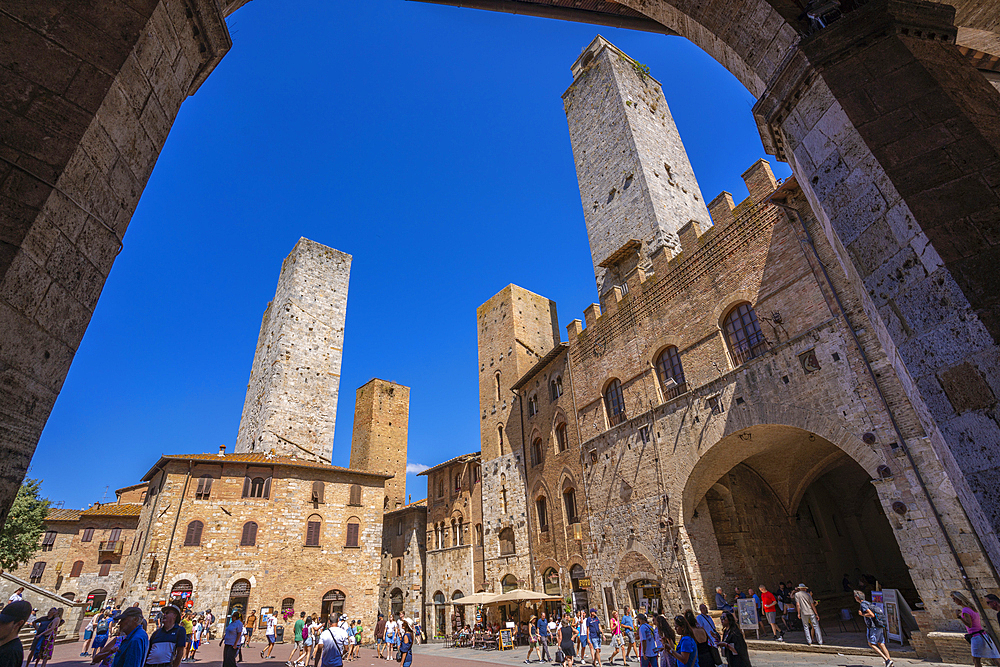 View of towers and Piazza del Duomo in San Gimignano, San Gimignano, UNESCO World Heritage Site, Province of Siena, Tuscany, Italy, Europe