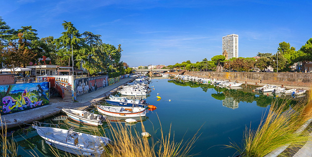 View of boats and reflections on the Rimini Canal, Rimini, Emilia-Romagna, Italy, Europe