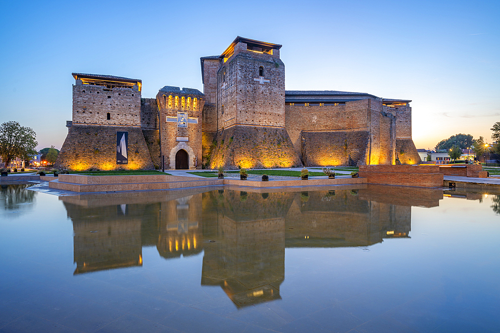 View of Castel Sismondo reflecting in ornamental water pool at dusk, Rimini, Emilia-Romagna, Italy, Europe