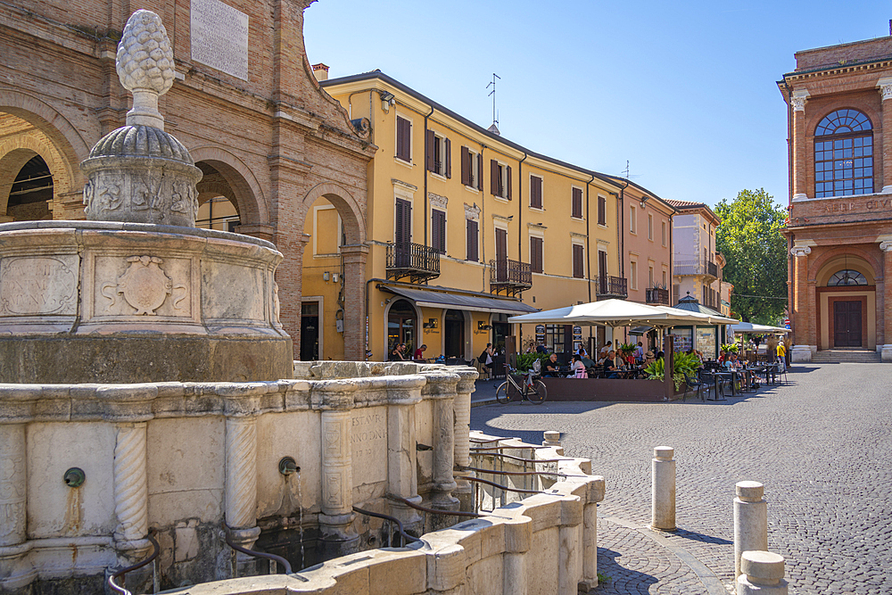 View of fountain and restaurant in Piazza Cavour in Rimini, Rimini, Emilia-Romagna, Italy, Europe