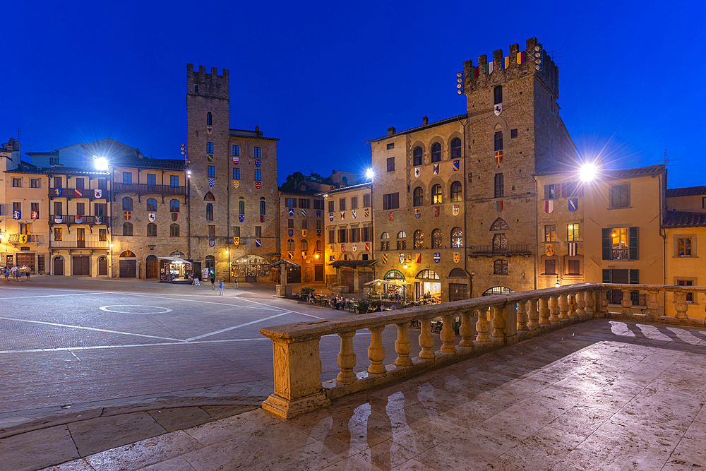 View of architecture in Piazza Grande at dusk, Arezzo, Province of Arezzo, Tuscany, Italy, Europe