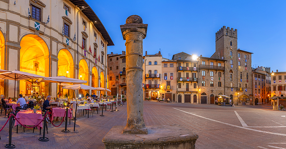 View of architecture in Piazza Grande at dusk, Arezzo, Province of Arezzo, Tuscany, Italy, Europe