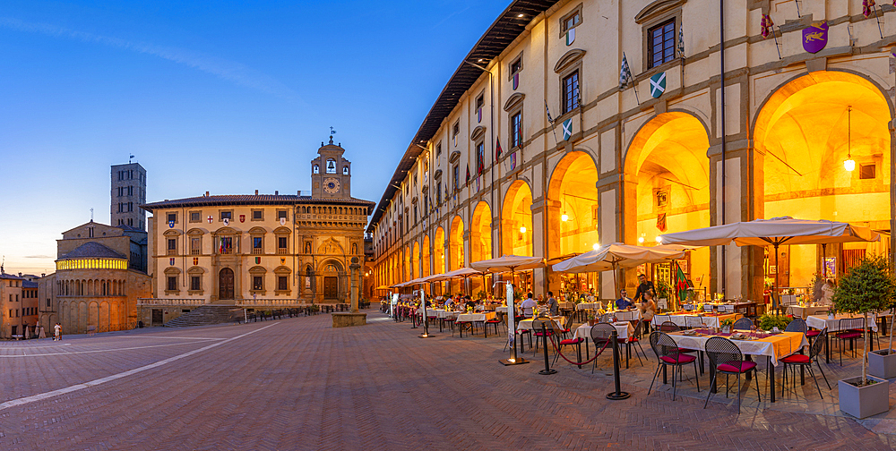 View of architecture in Piazza Grande at dusk, Arezzo, Province of Arezzo, Tuscany, Italy, Europe