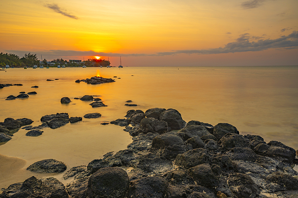 View of beach and Indian Ocean at sunset in Cap Malheureux, Mauritius, Indian Ocean, Africa