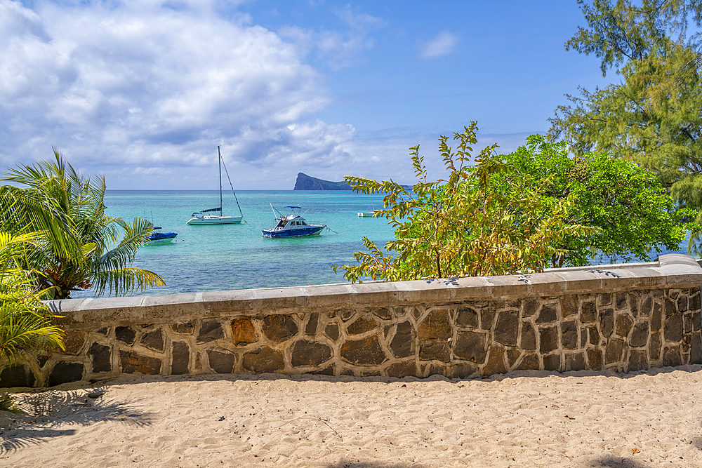 View of boats and turquoise Indian Ocean on sunny day in Cap Malheureux, Mauritius, Indian Ocean, Africa