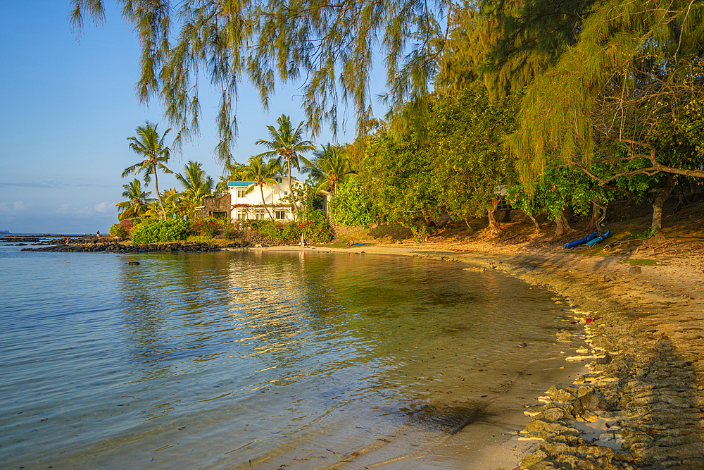 View of beach and turquoise Indian Ocean at sunset in Cap Malheureux, Mauritius, Indian Ocean, Africa