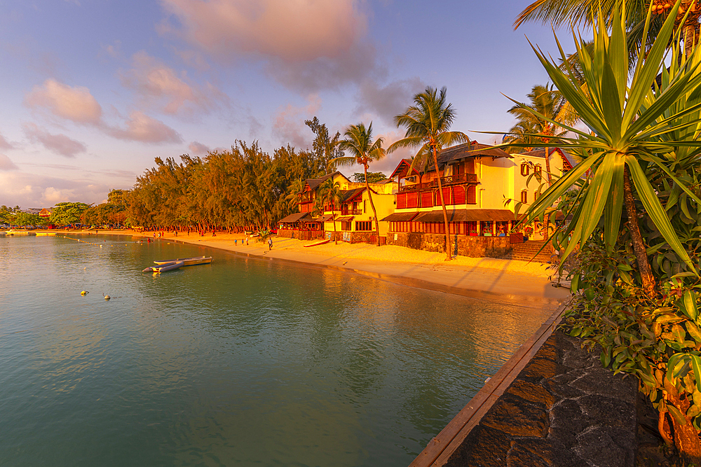 View of beach and boats in Grand Bay at golden hour, Mauritius, Indian Ocean, Africa