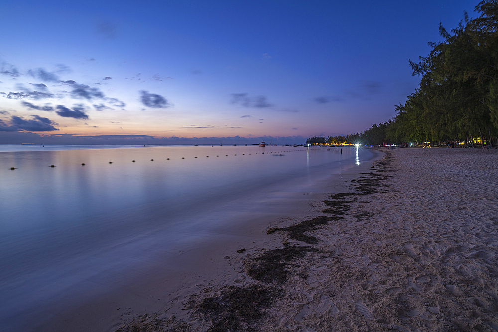 View of Mon Choisy Public Beach at dusk, Mauritius, Indian Ocean, Africa