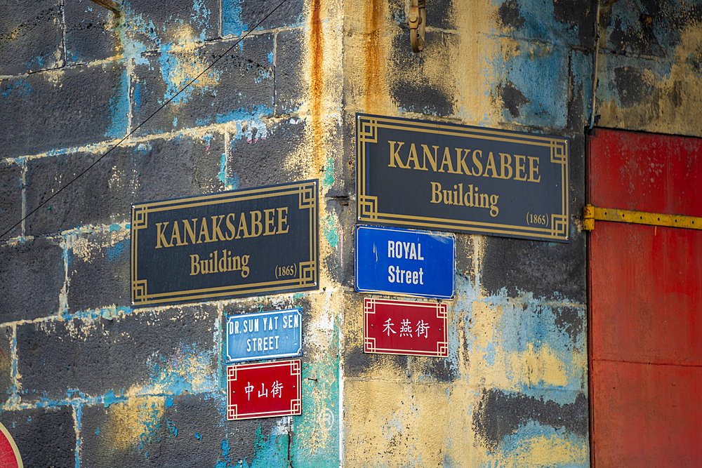 View of building and street signs on wall in Chinatown, Port Louis, Mauritius, Indian Ocean, Africa