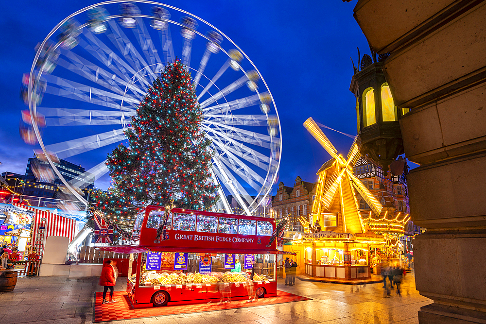 View of ferris wheel and Christmas Market on Old Market Square at dusk, Nottingham, Nottinghamshire, England, United Kingdom, Europe