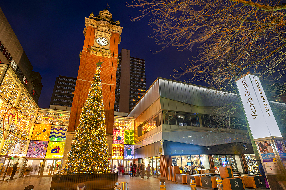 View of Victoria Station Clock Tower and Christmas tree at dusk, Nottingham, Nottinghamshire, England, United Kingdom, Europe