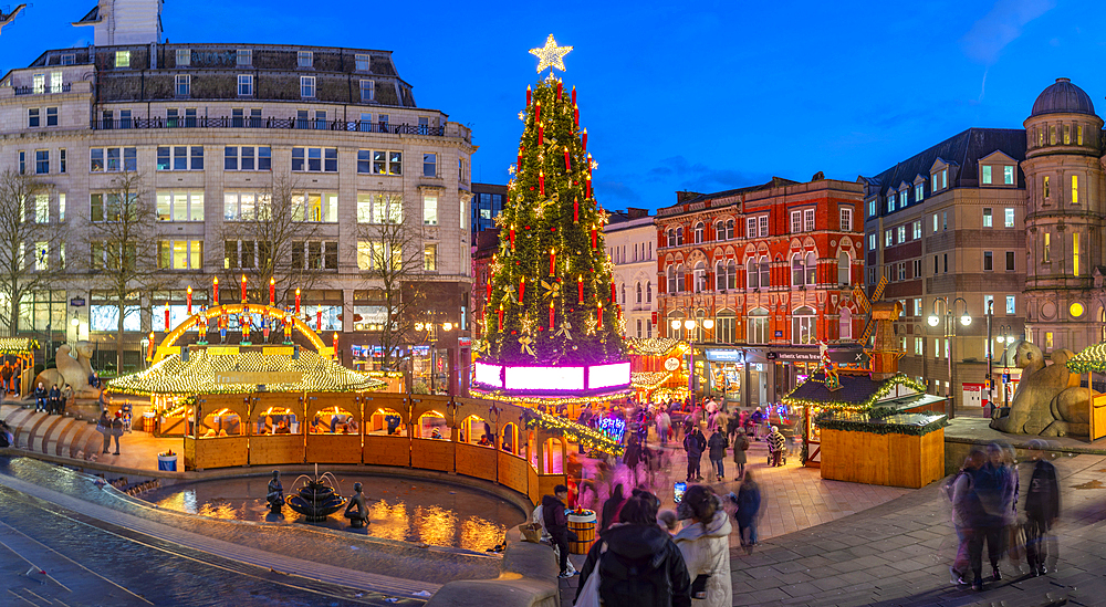 View of Christmas Market stalls in Victoria Square at dusk, Birmingham, West Midlands, England, United Kingdom, Europe