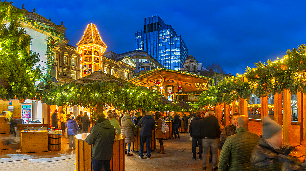 View of Christmas Market stalls in Victoria Square at dusk, Birmingham, West Midlands, England, United Kingdom, Europe