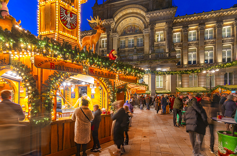 View of Christmas Market stalls in Victoria Square at dusk, Birmingham, West Midlands, England, United Kingdom, Europe