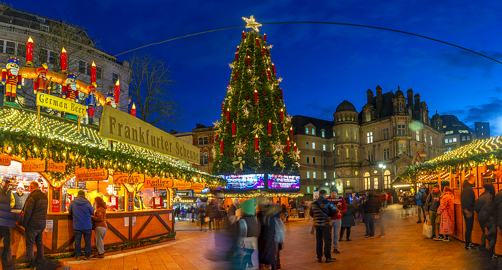 View of Christmas Market stalls in Victoria Square at dusk, Birmingham, West Midlands, England, United Kingdom, Europe