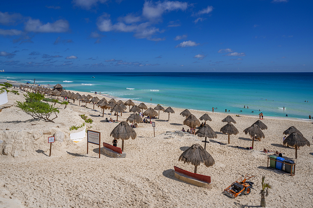 View of long white sandy beach at Playa Delfines, Hotel Zone, Cancun, Caribbean Coast, Yucatan Peninsula, Mexico, North America