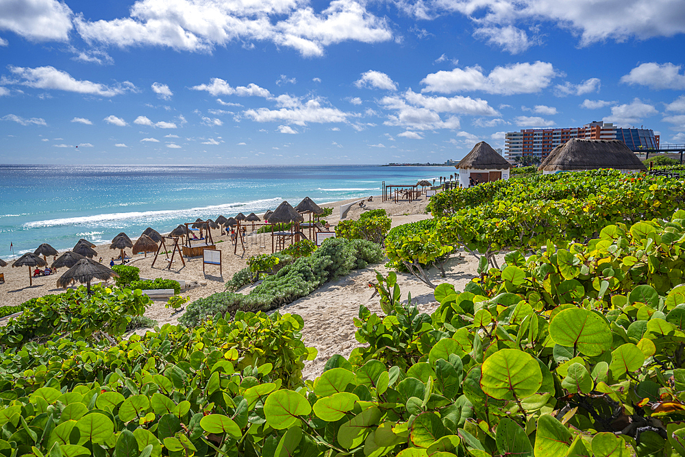 View of long white sandy beach at Playa Delfines, Hotel Zone, Cancun, Caribbean Coast, Yucatan Peninsula, Mexico, North America