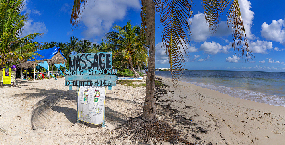 View of rustic massage sign on beach near Puerto Morelos, Caribbean Coast, Yucatan Peninsula, Mexico, North America