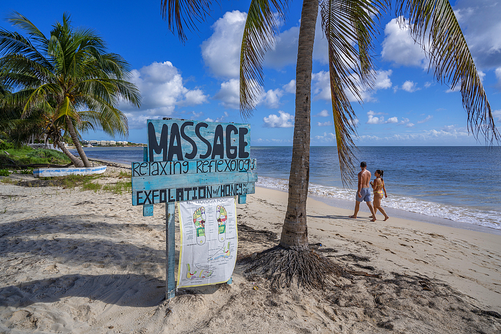 View of rustic massage sign on beach near Puerto Morelos, Caribbean Coast, Yucatan Peninsula, Mexico, North America