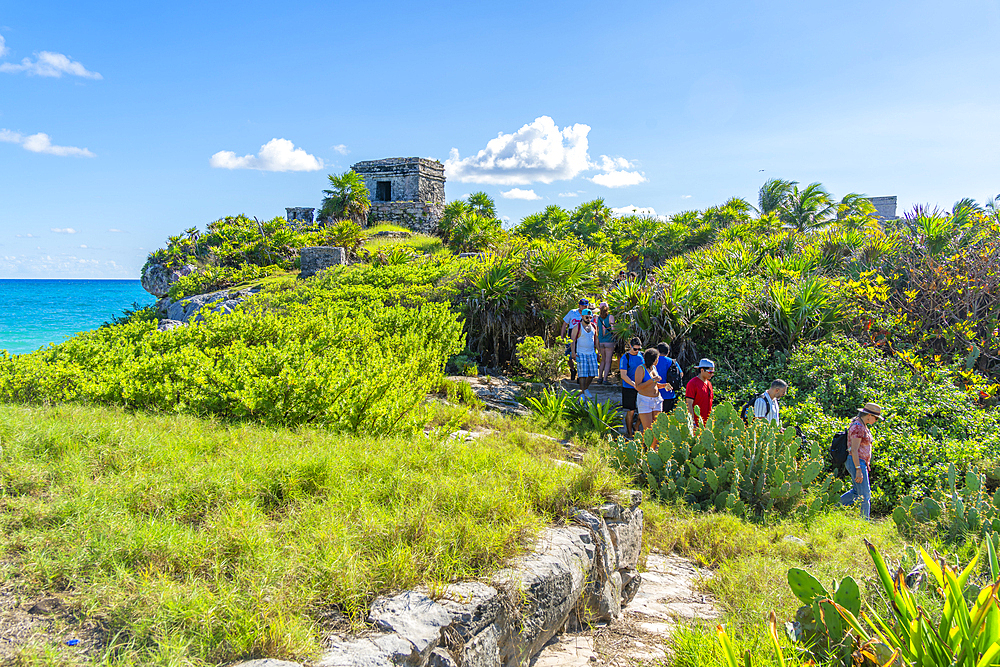 View of tourists and Mayan Temple ruins overlooking the sea, Tulum, Quintana Roo, Caribbean Coast, Yucatan Peninsula, Riviera Maya, Mexico, North America