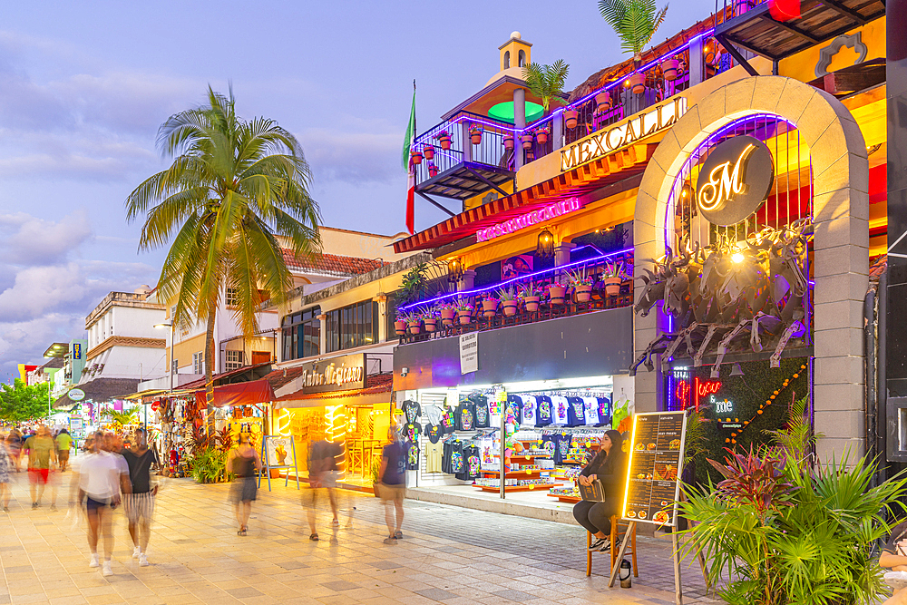 View of busy 5th Avenue at dusk, Playa del Carmen, Quintana Roo, Caribbean Coast, Yucatan Peninsula, Riviera Maya, Mexico, North America