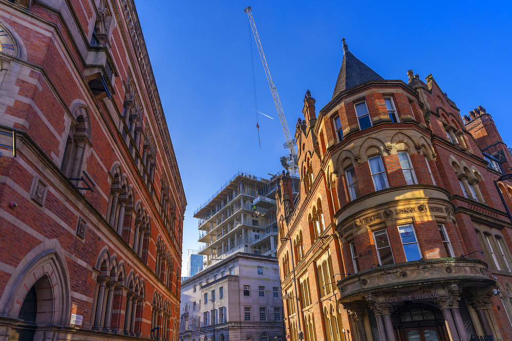 View of red brick architecture and new building on Albert Square, Manchester, Lancashire, England, United Kingdom, Europe